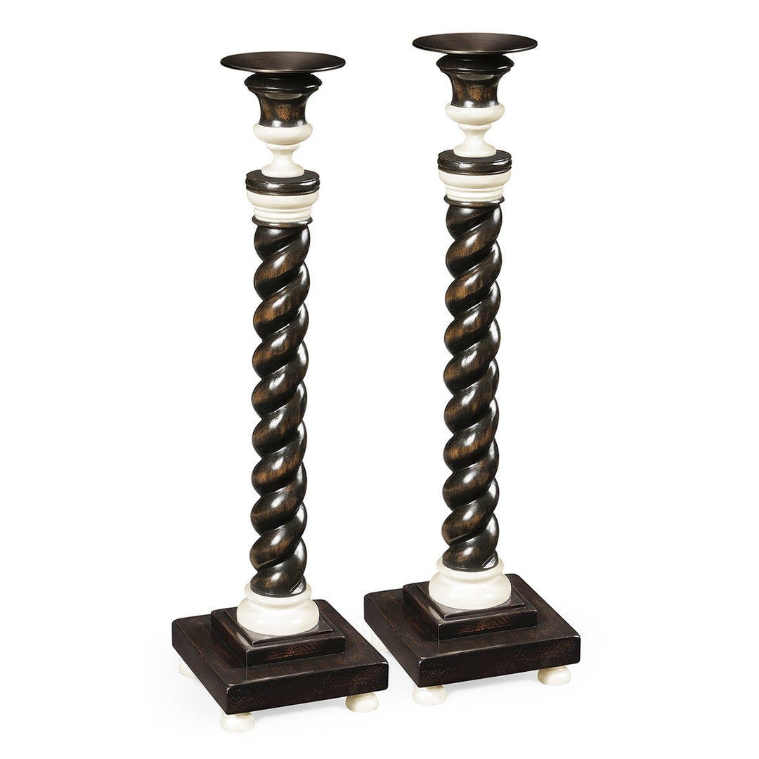 A Pair of Charcoal & Faux Bone Candlesticks