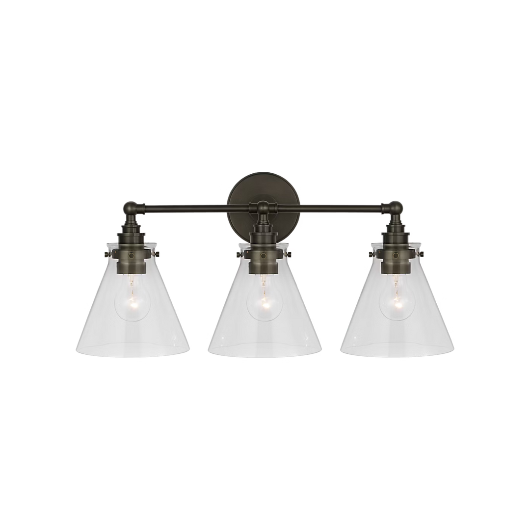 Parkington 24" Three Light Bath Bar in Bronze with Clear Glass