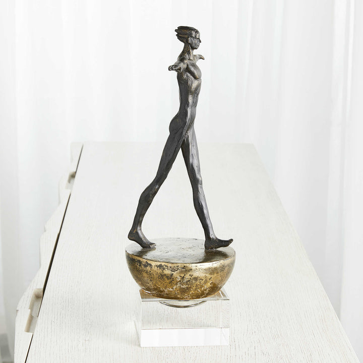 Man Finding Balance Sculpture