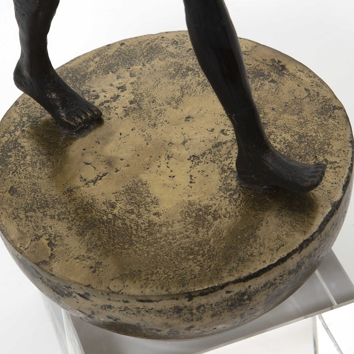Man Finding Balance Sculpture